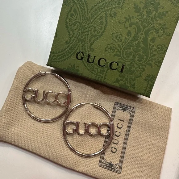 NIB Gucci Silver Logo Hoop Earrings - Picture 1 of 4
